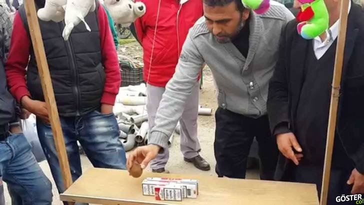 Sigara Devirme Oyunu ile Suriyeli Mültecileri Yolan Adam