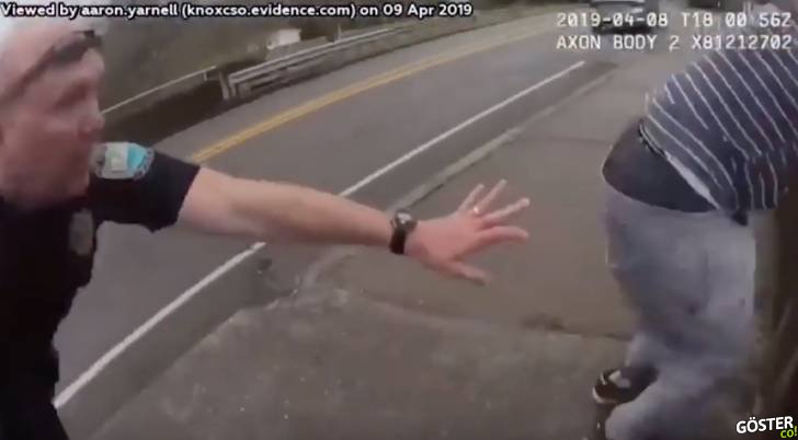 Polis, köprüden atlayan kişiyi son anda ayağından yakalayarak kurtardı